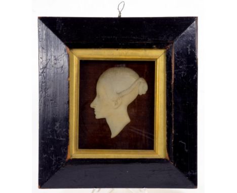 A WAX PORTRAIT RELIEF OF THE HEAD OF A YOUNG WOMAN IN EBONISED FRAME 24CM X 22CM LATE 19TH CENTURY