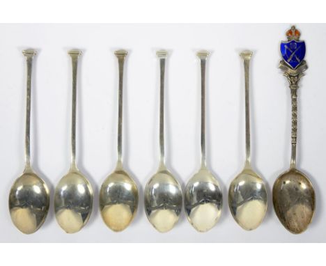 A SET OF SIX GEORGE V SILVER SEAL TOP COFFEE SPOONS BIRMINGHAM 1926 AND A SILVER AND ENAMEL SHOOTING PRIZE SPOON, 2OZS
