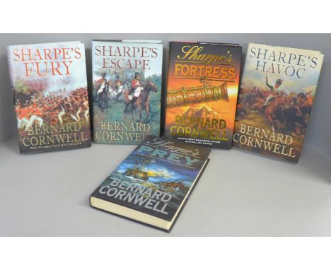 Five hardback first edition novels by Bernard Cornwell from the Sharpe series; Sharpe's Fortress 1999, Sharpe's Prey 2001, Sh