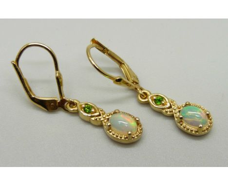 A pair of silver gilt, Ethiopian opal and peridot drop earrings 