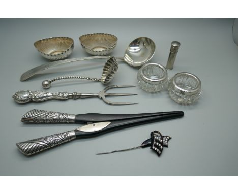 A pair of Victorian silver mounted glove stretchers, a toasting fork with silver handle, a pair of silver rimmed salts, a pla
