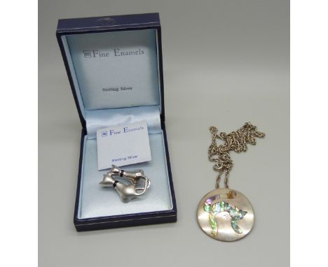 A silver and abalone cat pendant on a silver chain and a 925 silver and enamel cat brooch 