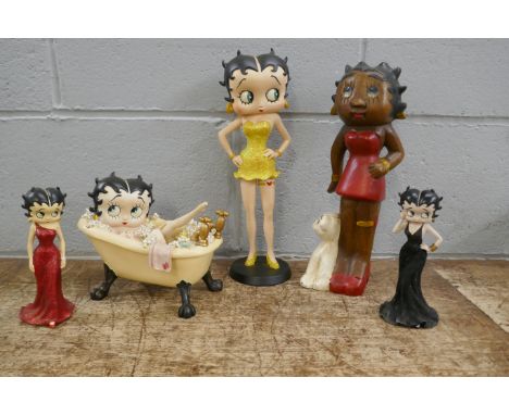 Six Betty Boop resin figures including one in lemon yellow glitter dress, one in bathtub, one seated on a sofa (boxed) 