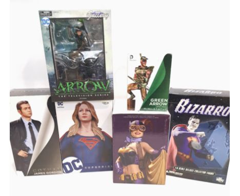 Quantity of DC Collectibles Includes DC Comics Bombshell Batgirl Statue, Bizarro 1/6 Scale Figure, Green Arrow Mini Statue wi