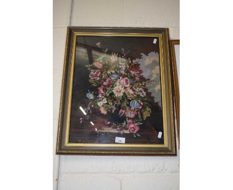 A tapestry picture of flowers