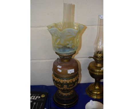 Ceramic based oil lamp with vaseline glass shade