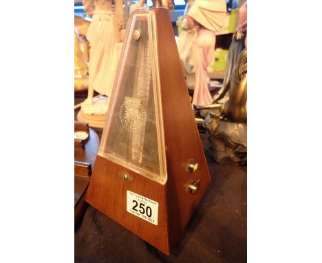 Clockwork metronome with perspex front 