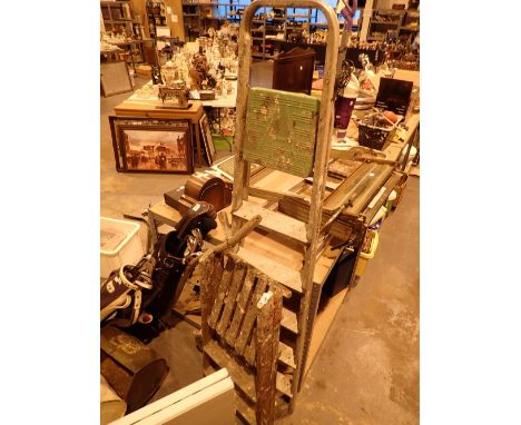 Five step aluminum step ladder and a two step wooden step ladder