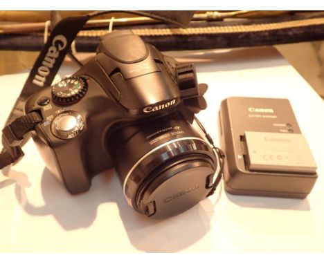 Canon XS3015 digital camera with spare battery and charger 