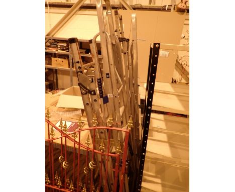 Two pairs of aluminium step ladders one extending 