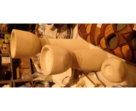 Two large and one small matching ceramic candle holders 