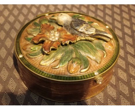 Circular metal jewellery and ring box with enamel bird decoration 