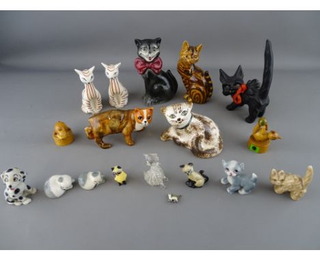 Mixed collection of cat and dog ornaments including Wade TV pets, Szeiler and other makers along with an interesting miniatur