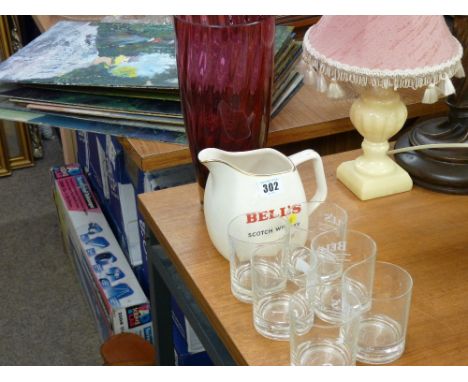 Set of six Bells Scotch whisky tumblers, Bells Scotch whisky jug and a cranberry glass vase