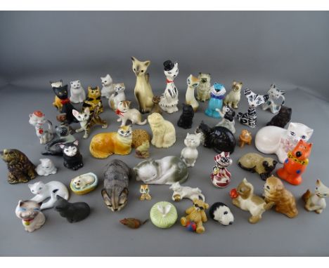 Large collection of mainly ceramic cat ornaments