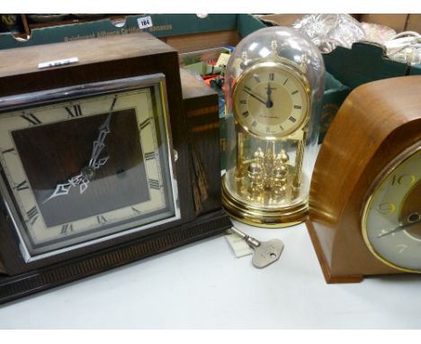 Art Deco style polished mantel clock, another mantel clock and a boule dome clock etc
