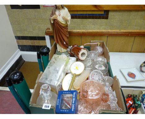 Box of mainly glassware, ornamental figure of Jesus Christ, vintage alarm clock etc