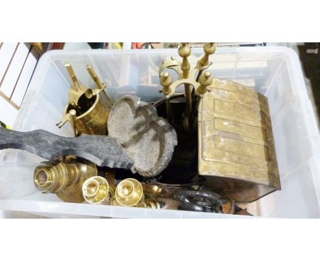 Pair of brass candlesticks, a brass oil lamp, a metal walking stick stand, two fireside companion sets, a metal coal bucket, 