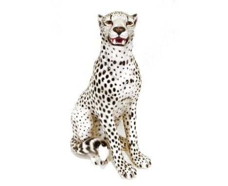 Large ceramic cheetah, 75cm tall approx., a pair of cranberry glass table lamps with matching lampshades and a wire wool mode