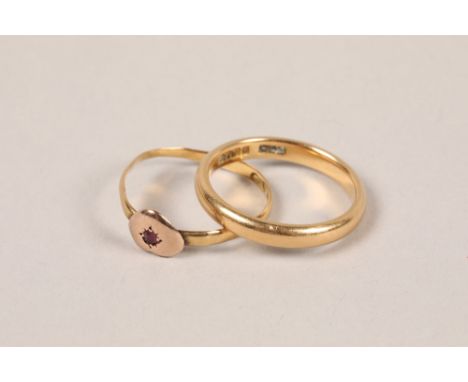 9 carat yellow gold wedding bandl; ring size M; together with a 9 carat yellow gold and ruby set heart ring; ring size K; gro