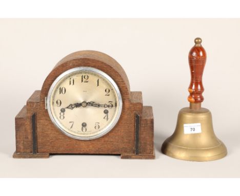 Brass hand bell; 26cm high and a mantle clock; 30cm long