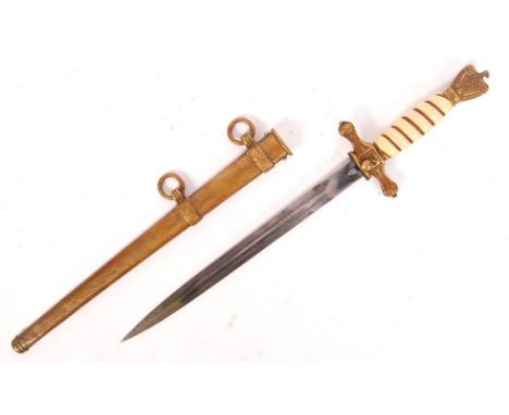 A WWII Second World War German Kriegsmarine Navy dagger. With engraved blade, gilded brass scabbard and mounts. With eagle po