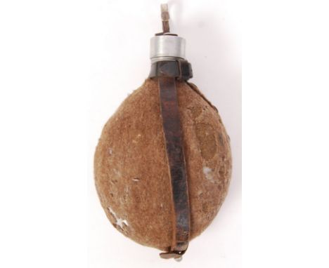 A rare WWI First World War German soldier's / infantry water bottle. Original tan canvas covering, with leather strapping. Sc