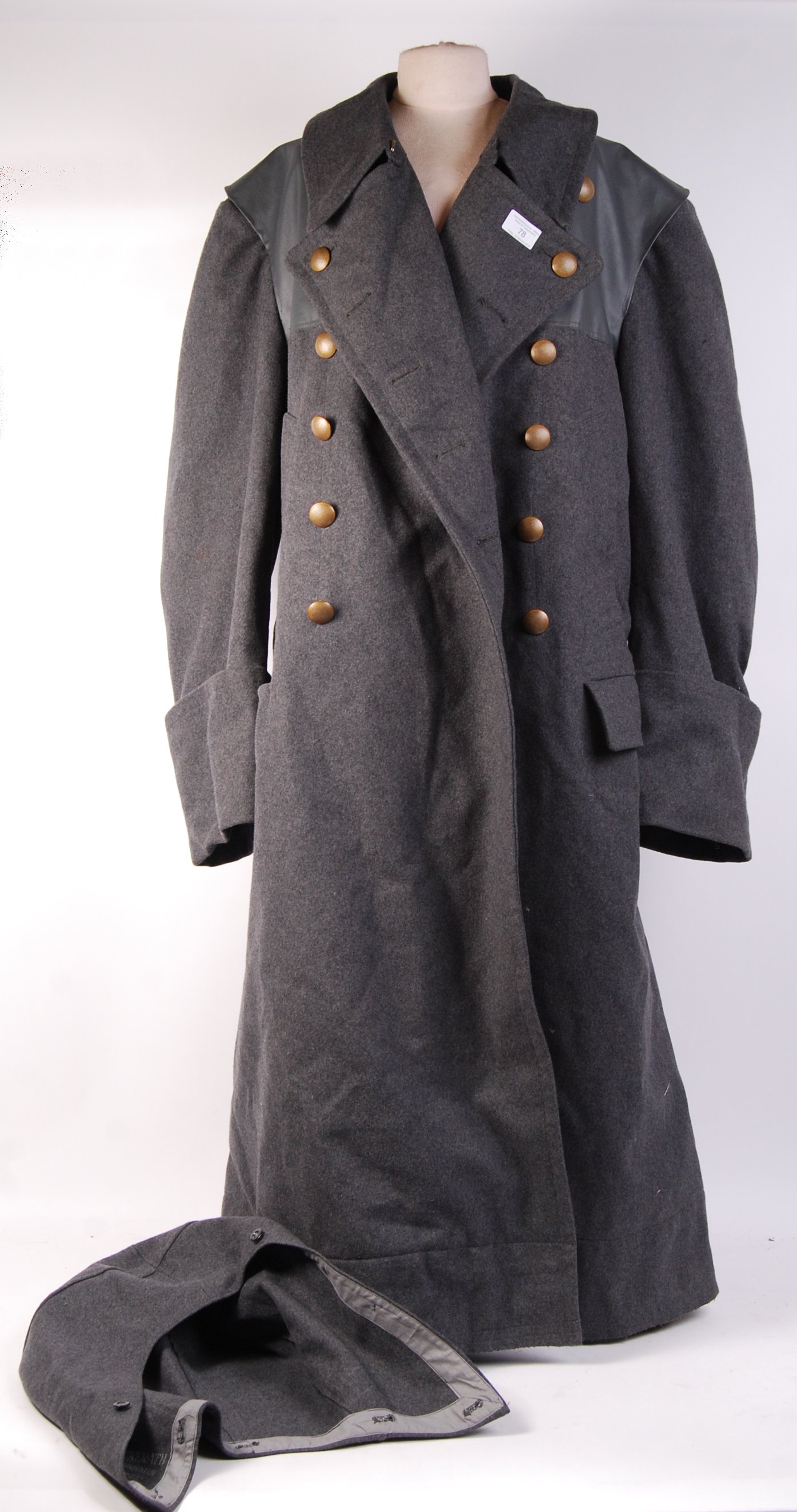 A post war military issue German great coat in grey wool with grey faux ...