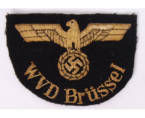 An original WWII Second World War Nazi German Third Reich railway WVD Brüssel fabric patch, with eagle swastika emblem to fro