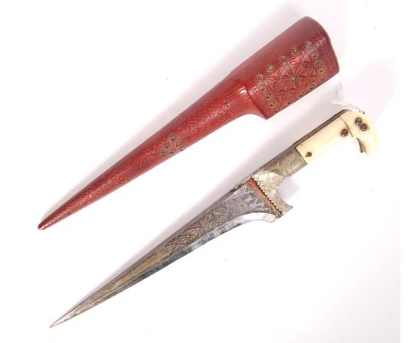 An Afghan / North African Pesh-Kabz choora knife Karud dagger having ' T ' section straight edged blade with etched decoratio