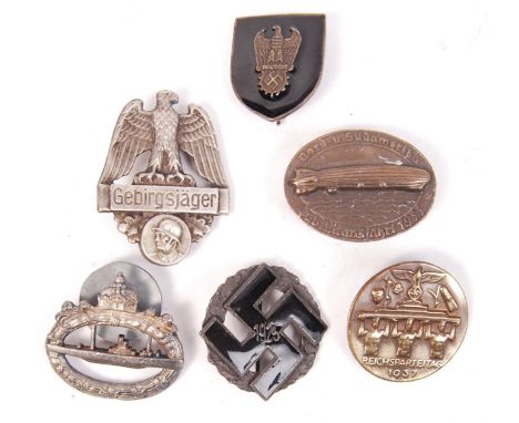 A collection of 6x WWII Second World War related German military badges and awards. To include; Reichsparteitag, U-Boat badge