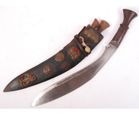 An unusual antique 19th century Indian / Nepalese Kukri knife. Complete with Karda &amp; Chakmak. Within it's original leathe