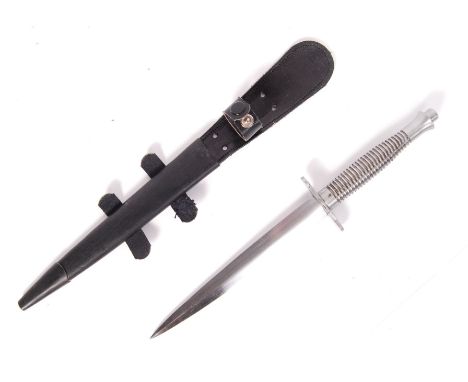 A WWII Second World War replica Fairbairn Sykes 2nd pattern F-S all steel fighting knife and scabbard, having the bevelled po