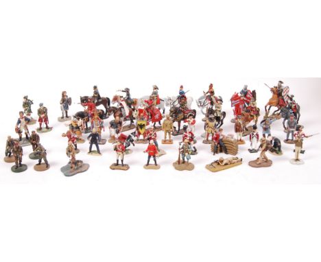 A large collection of approximately 50+ metal miniature models of soldiers at war to include; W. Britains, Del Prado and Corg