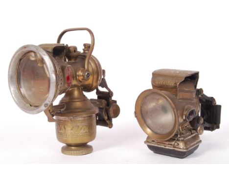 Two antique / vintage bicycle paraffin lamps - the first being a ' Miller's Cetolite ' lamp with inset blue/red ' Millers ' p