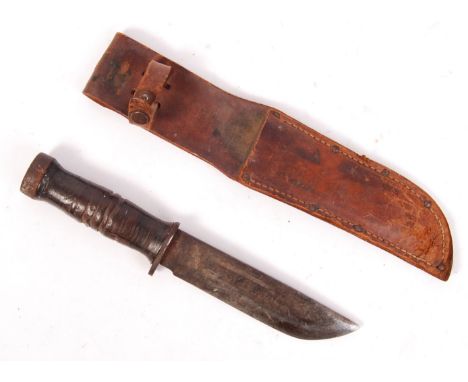 An original WWII Second World War American 225Q combat fighting commando utility knife having a leather wrapped handle, short