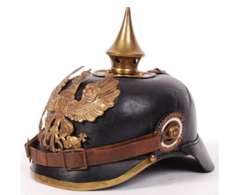 An original WWI First World War Imperial German / Prussian Pickelhaube uniform helmet. Leather construction, with brass furni