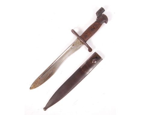 A WWII Second World War Spanish M1941 Bolo bayonet for Mauser rifle. Marked 6111 R to top of blade to scabbard. Within the or