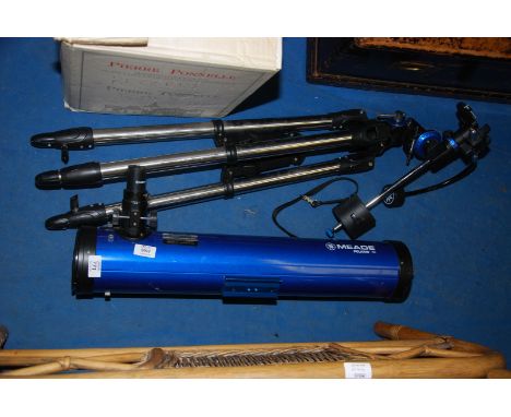 A "mead Polaris 76" telescope.