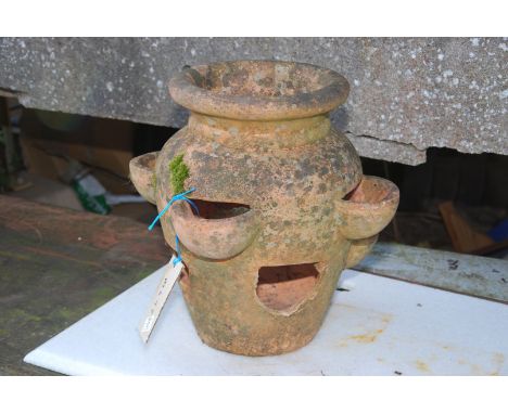 A terracotta strawberry planter [a/f] 15" high.