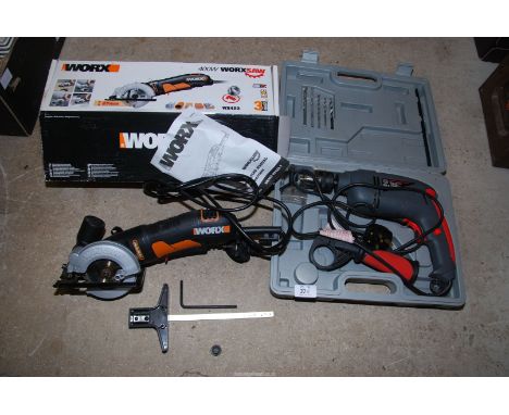 A "Worx" router (as new) and a hammer drill.