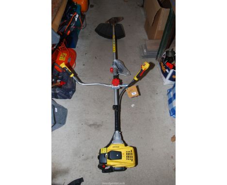 A "Stanley" petrol brush cutter, engine turns and has good compression.
