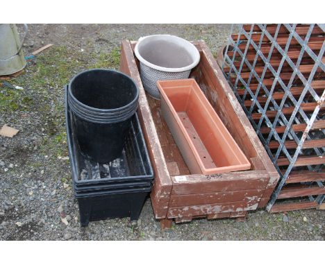 A wooden Planter/trough, plastic planters, etc 