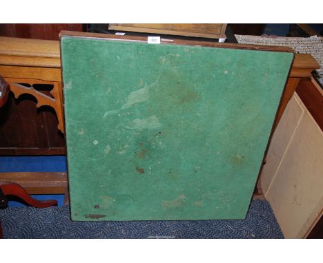 A folding card table, (as found).