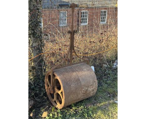 A heavy Cast and Wrought Iron Garden Roller of traditional form.