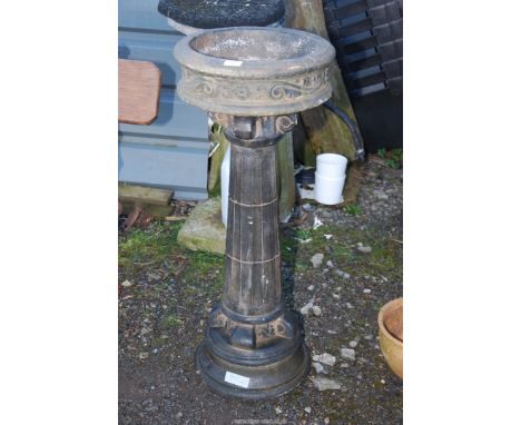A concrete bird bath/planter on column, 37" high x 17" diameter.