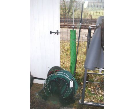 A quantity of fishing items, landing nets, keep nets, angling umbrella with extending bank stick, etc.  **