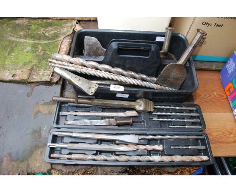 A box of drill bits, chisels, bolsters, etc.