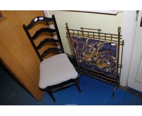 A brass framed fire screen depicting pheasants and dining chair.