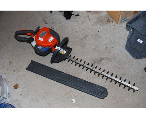 A "Husqvarna" petrol hedge trimmer, engine turns and has good compression.